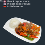 33. I black pepper sauce Oksekød
